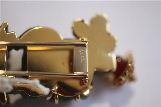 A Seaman Schepps 18ct gold, nephrite and gem set clip brooch modelled as an Oriental gentleman on a horse, 56mm.
